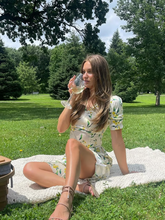 A girl wears a silk dress